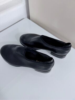 Bloch Black Slip-On Tap Dance Shoes
Size: Women’s 7 M (Medium / Standard Width)